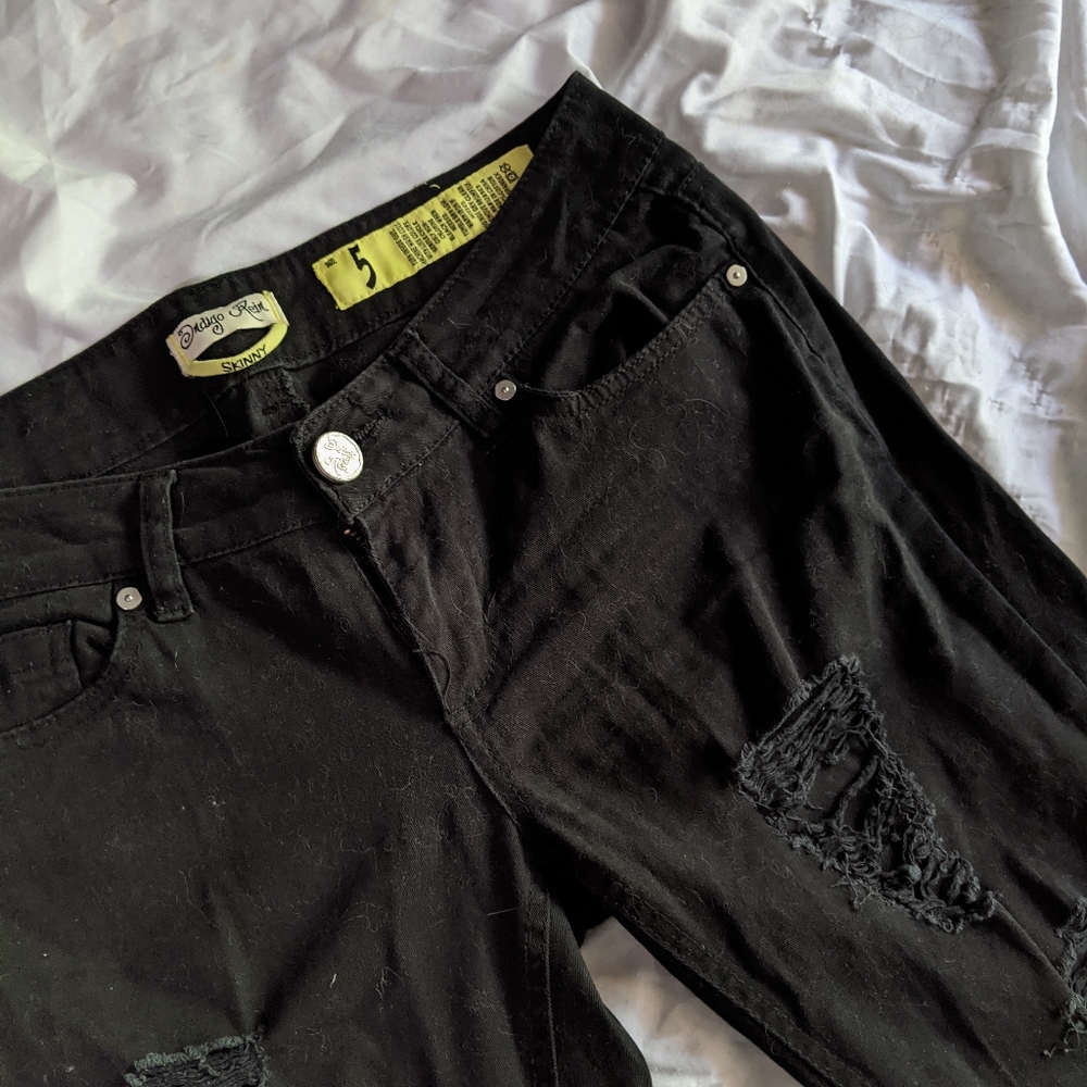 Ripped black low-rise skinnies